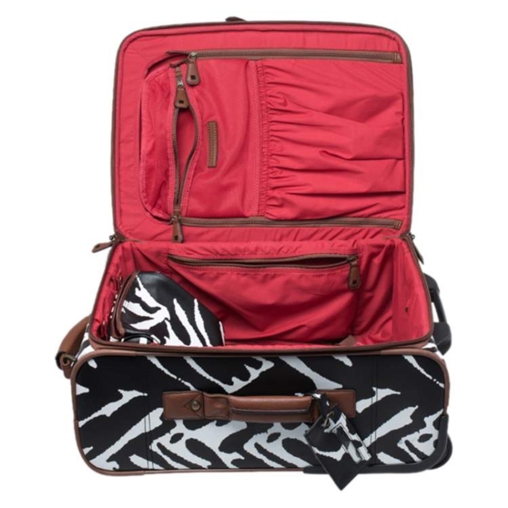 Diane Von Furstenberg limited addition B/W luggage set. Includes 4 pieces